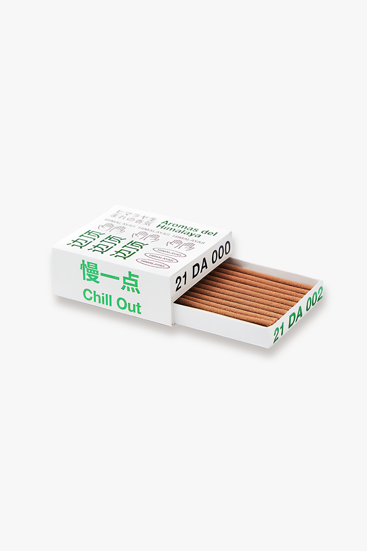 A white matchbox with green text reading 'Chill Out' and '21 DA 000' on a light gray background. The box is slightly open, revealing thin brown matchsticks inside.