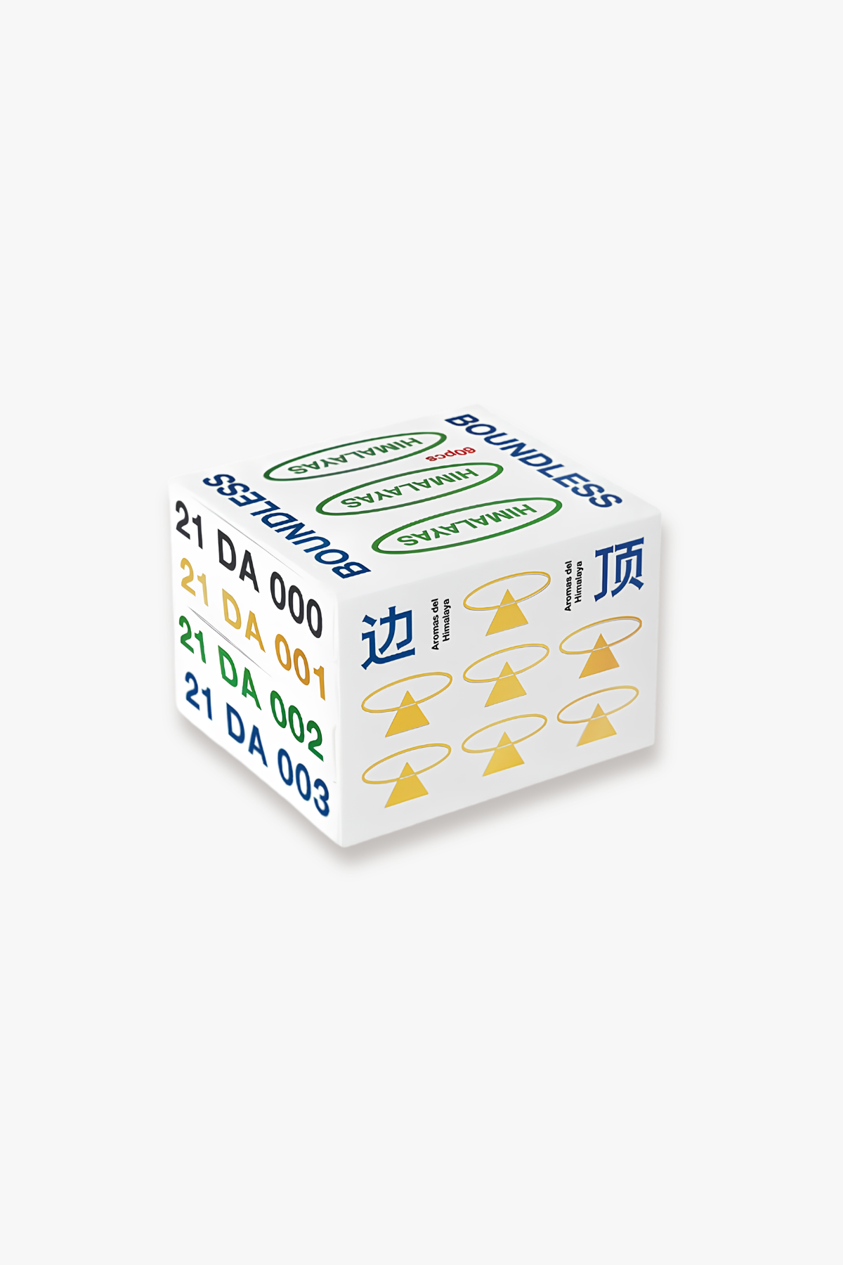 Three boxed scented incense products arranged on a brown wooden surface, with a woven cane chair back in the background. The boxes are white with printed text and symbols; one box reads 'BOUNDEDLESS' and the others show incense stick details and 'Herbal Incense From the Himalayas'.