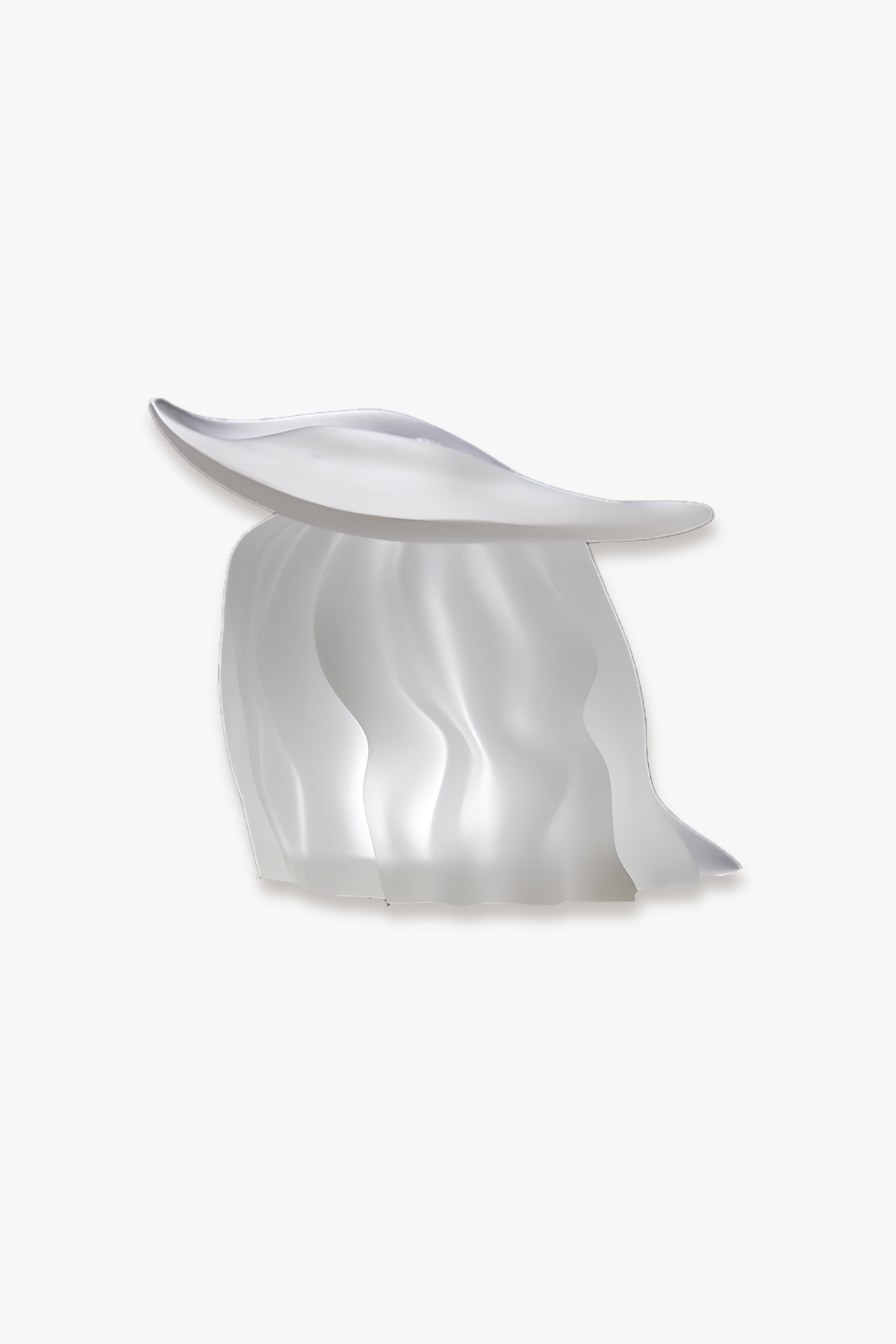 A sculptural, organic-shaped table or stool with a translucent white glass or acrylic body and a curved top, shown on a plain light gray background.