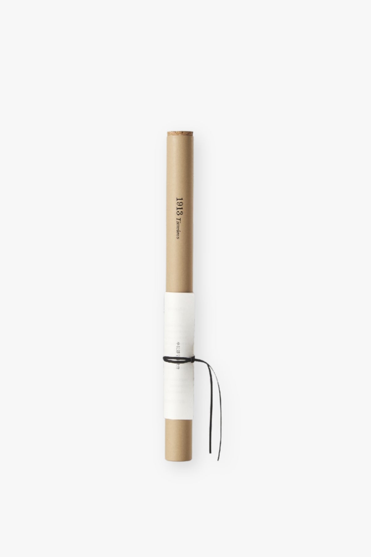 White cylindrical product with a wooden top on a white background