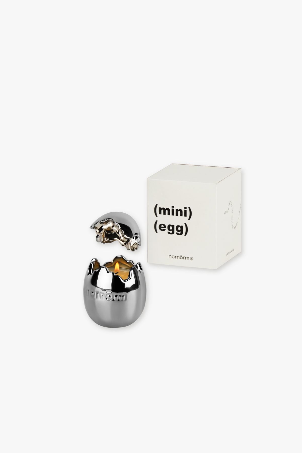 nornorm Metallic egg-shaped object with a smaller egg inside, next to a white box labeled 'mini (egg)'.