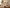 Calm living room interior with a candle, incense diffuser, soft daylight, and natural textures for a quiet home atmosphere
